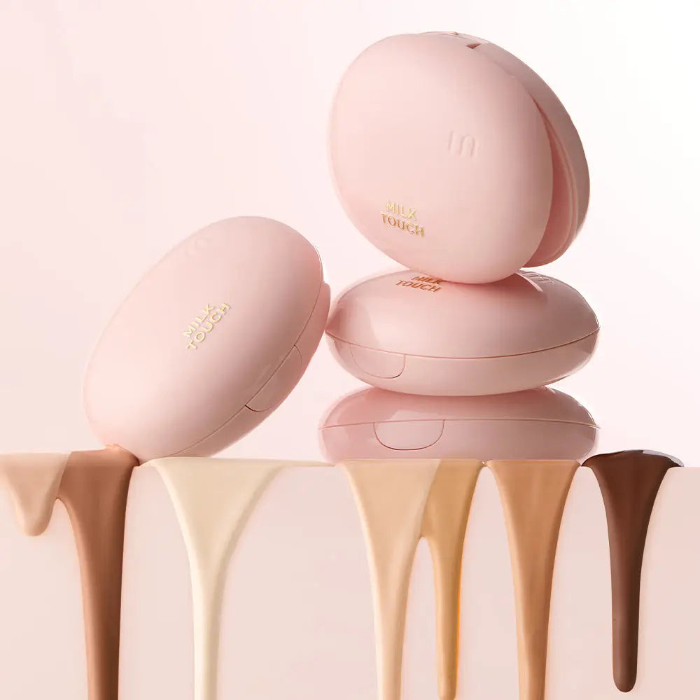 Light pink oval makeup cushions with foundation swatches in various skin tones from Milk Touch